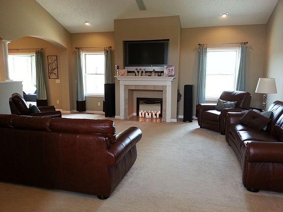 Great room, faux fireplace, tv built in.
