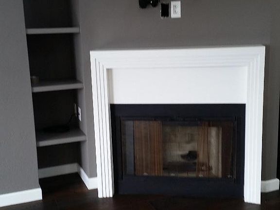 Lovely fireplace with tv mount and cables ready to attach