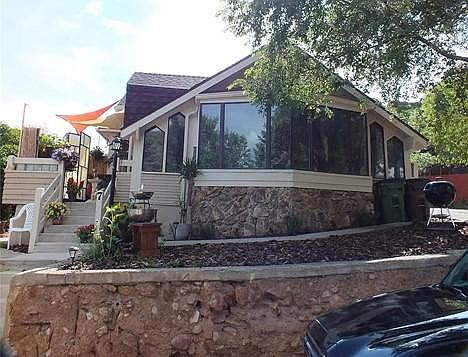 2 Bedroom 1 Bathroom - 1700 sqr ft. Grand front Windows, Front Porch Area, Stone Sided cathedral like front