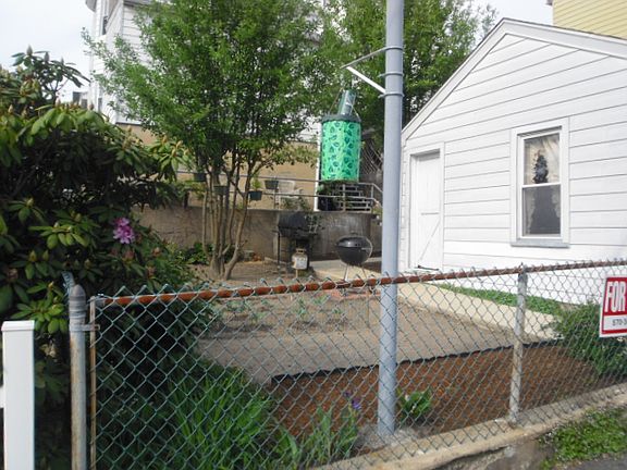 Fenced Back Yard (abuts Pine St.)