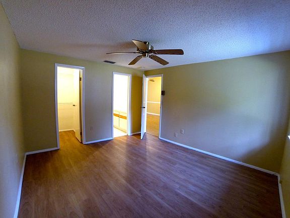 Master bedroom with walk-in closet and bathroom