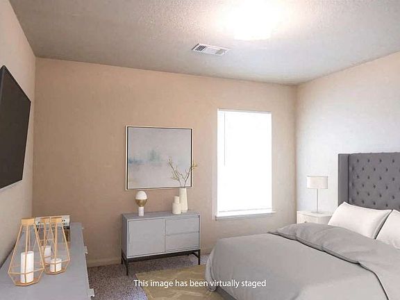 Bedroom with lots of natural lighting