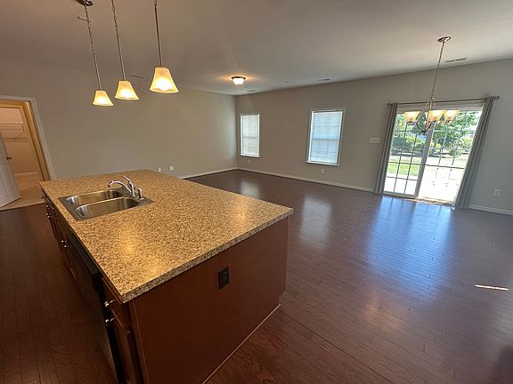 From kitchen into living room and dining area