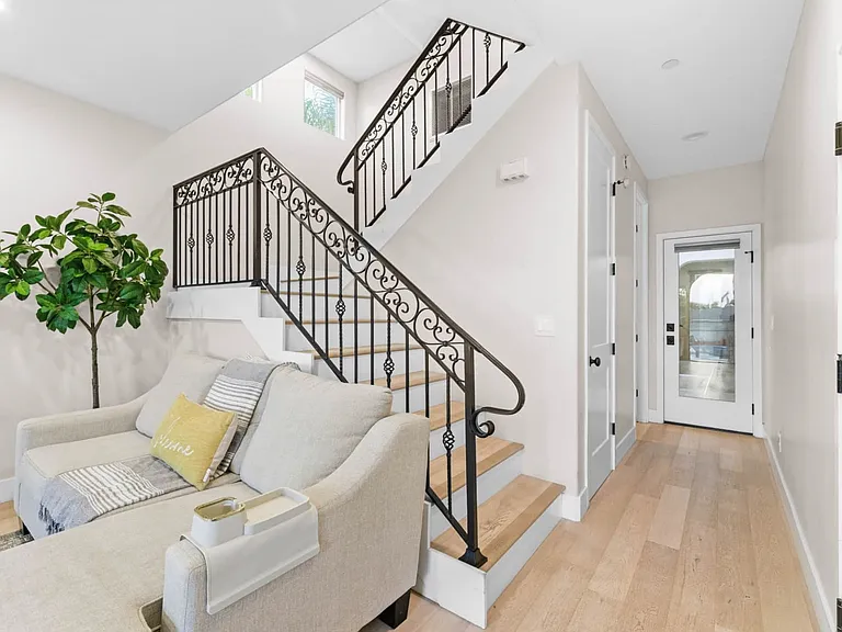 stairs and hallway to downstairs full bathroom