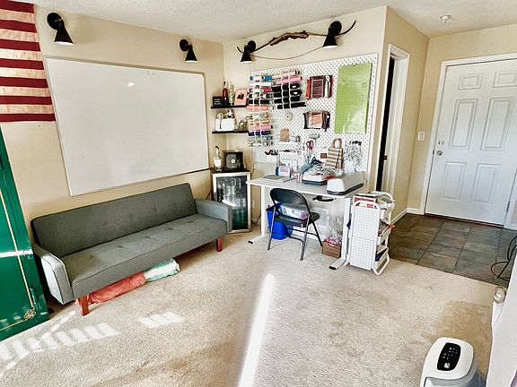 Right inside the front door, down Stairs bedroom/ office with access to garage