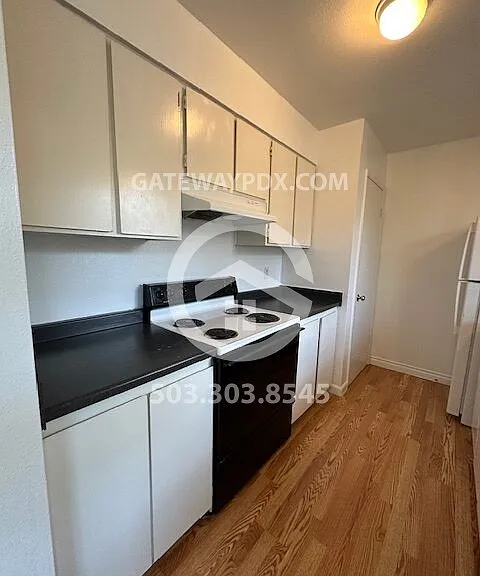 1441 NE Paropa Ct — Photo 12