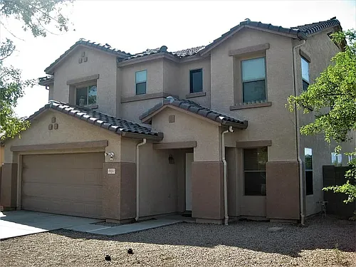 5931 W Albeniz Pl Photo 1