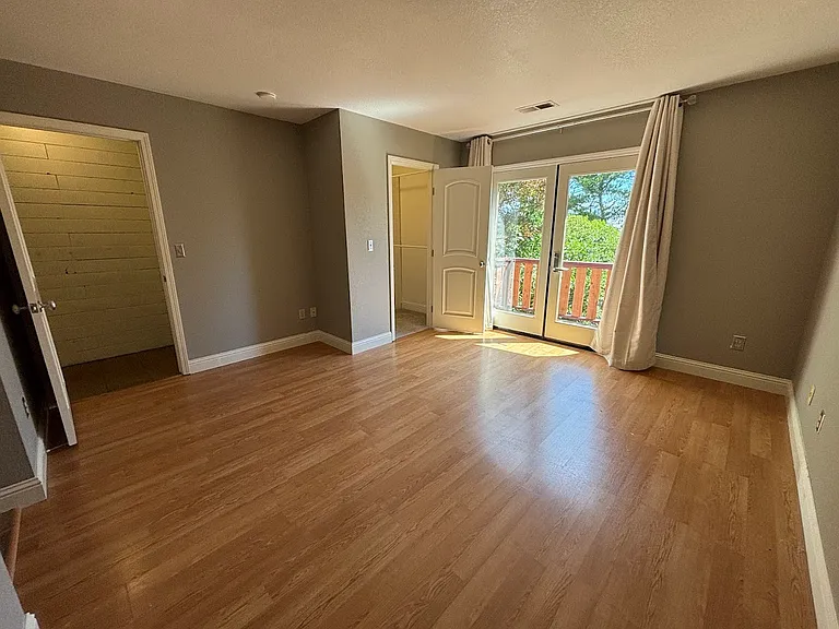 Primary bedroom with private deck access
