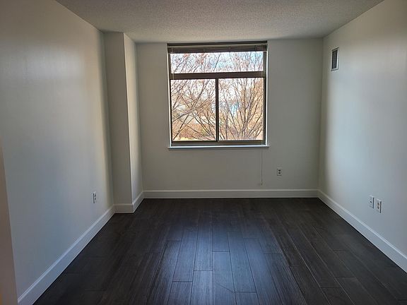 5th image of 7111 Woodmont Ave APT 303