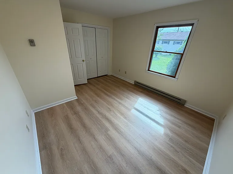2nd bedroom with all new flooring