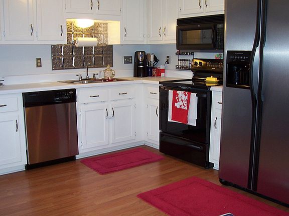 Kitchen*being tiled in beige