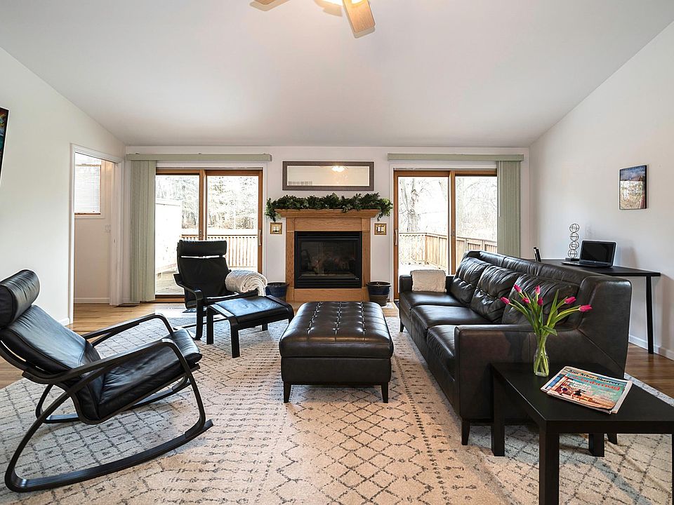 Large living room opens onto private deck and fenced yard