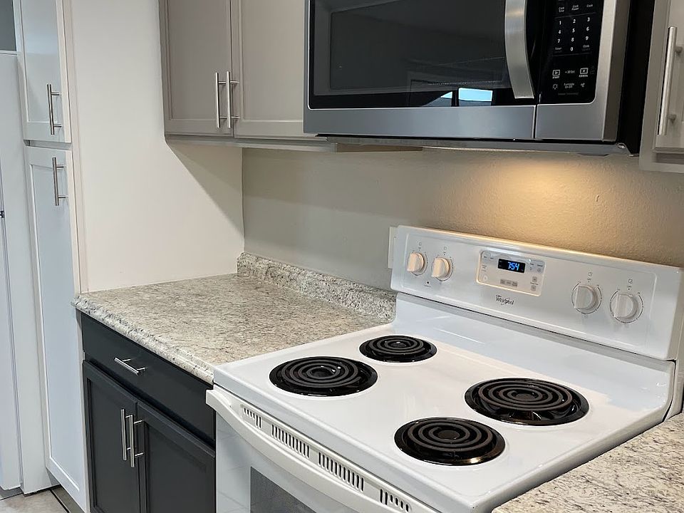 Kitchens have plenty of storage and microwaves.