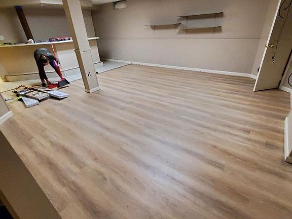 basement has a built in bar and large storage closet