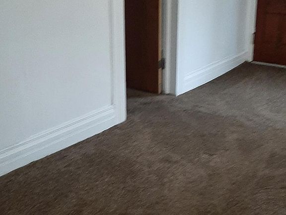 Living room, looking toward bedroom door