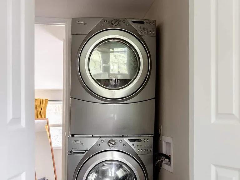 "Utility hallway" there is a different washer/dryer in the house currently.