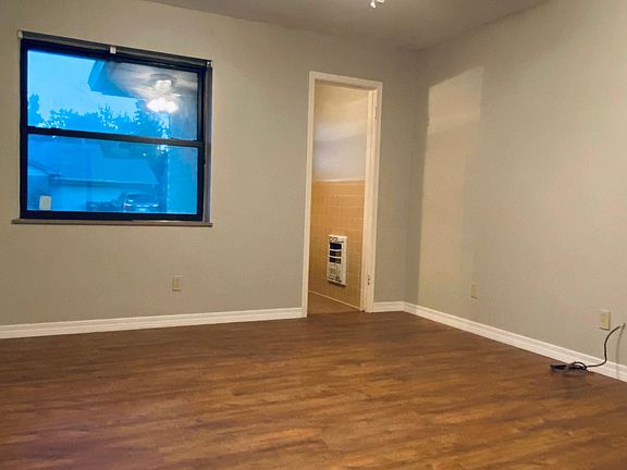 Primary bedroom with half bath