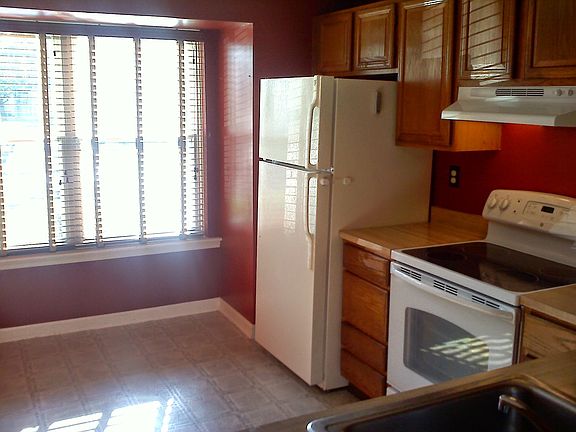 Kitchen - prior to flooring being replaced.