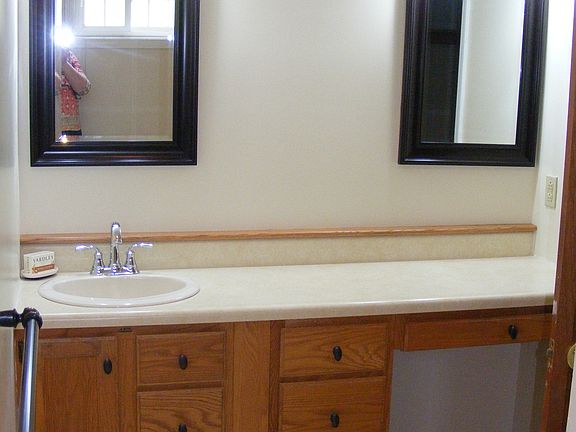 The master bathroom. All of the sink faucets in the apartme