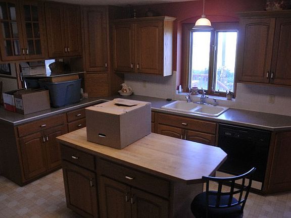 Kitchen : New oak cabinets, lots of storage, island too!