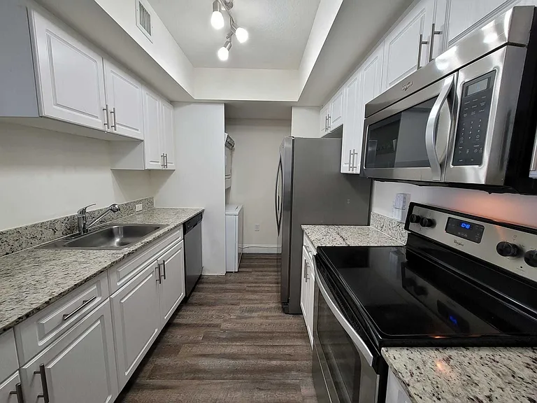 Kitchen with Granite countertops and Stainless Steel Appliances