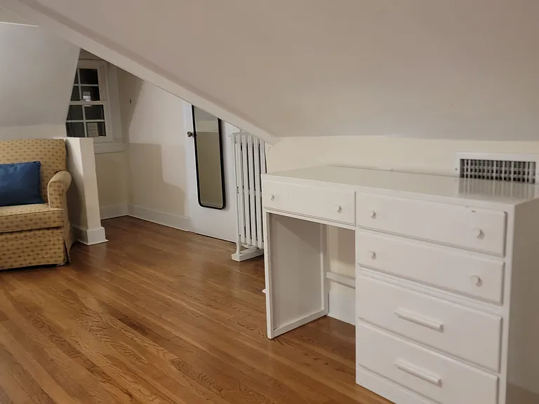 Upstairs third bedroom with two single beds