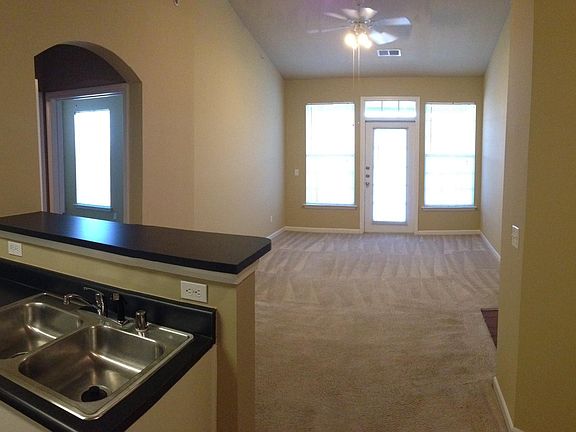 Archway into the bedroom hallway area
