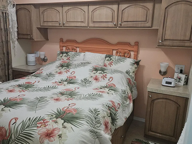 VERY comfy Queen bed - large drawers under bed and small drawers under large, deep closet.. plenty of space