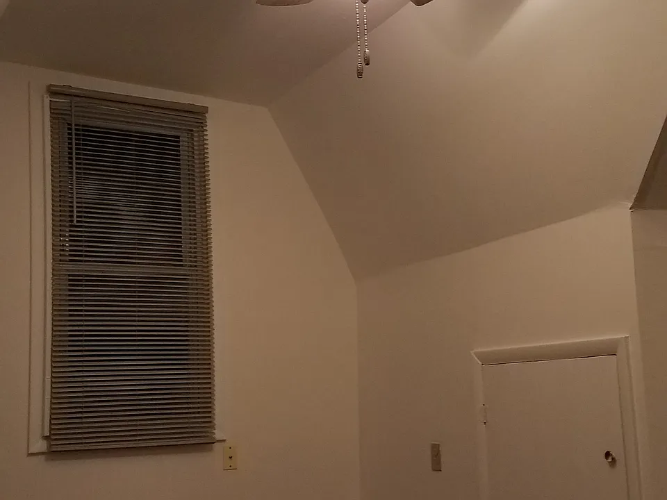top floor private bedroom with cubby storage & large walk-in closet in the front