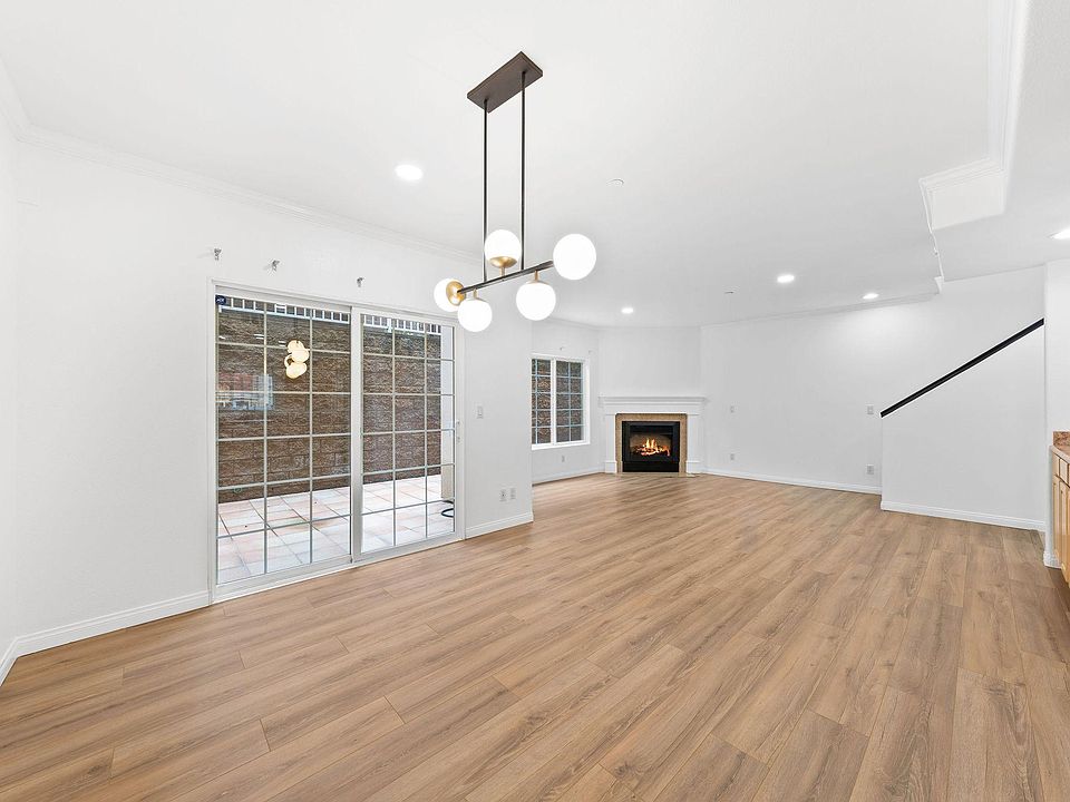 View from kitchen - dining room and living room with bar area.