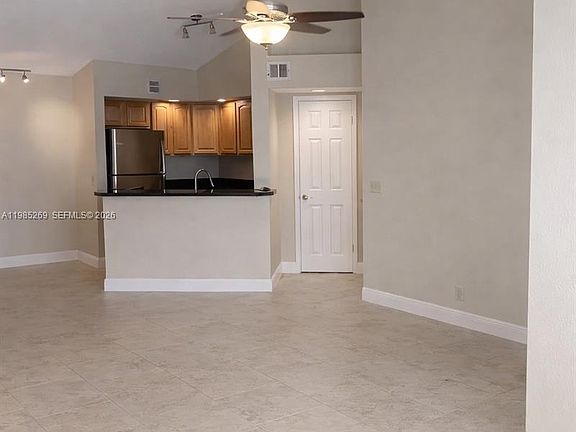2nd image of 3410 Pinewalk Dr N APT 827