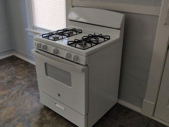 Brand new gas range and kitchen floor