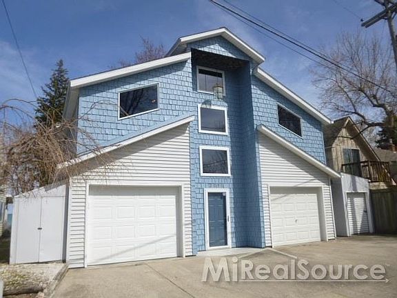 note the sheds and storage garage for golfcart