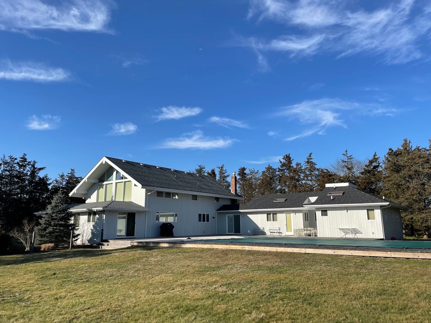  rear view of main house, guest quarters and pool