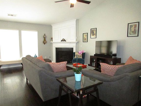 Lots of natural light pours into this beautiful room that re