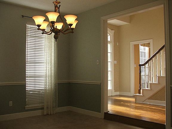 2nd Dining Room shot from kitchen hallway showing foyer, stairway and study areas