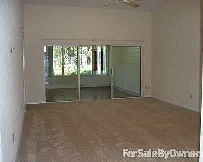 Living room
						:
						Looking into enclosed Florida room