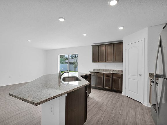 This move-in ready home features gorgeous granite countertops in the kitchen
