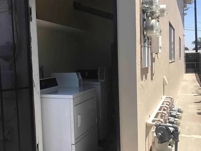 Shared laundry room in the rear