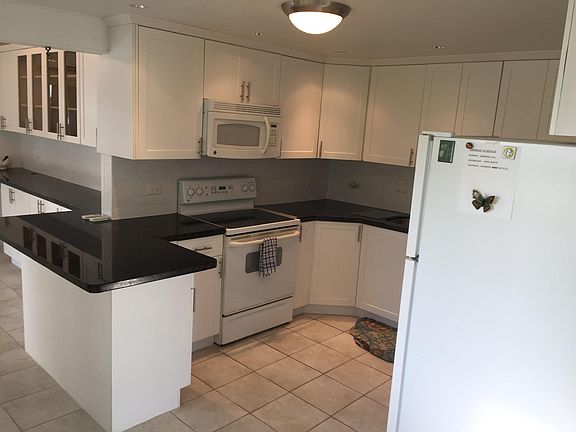 Full kitchen, dishwasher, oven, microwave, garbage disposal, refrigerator.