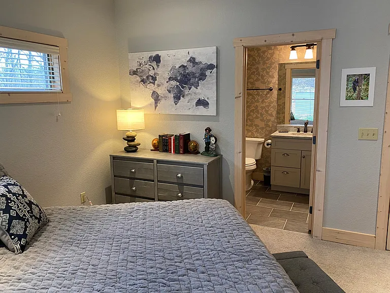 Full bath with soaking tub in guest bedroom #1.