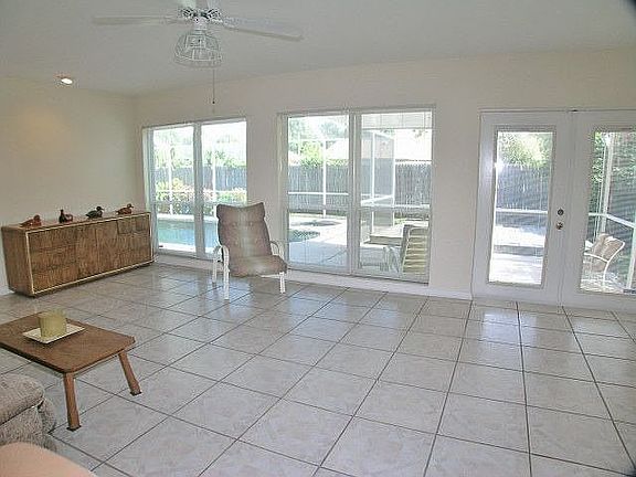 Huge living room has wall of windows