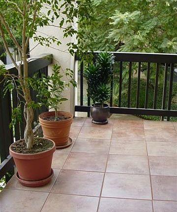 Wrap-around tiled balcony