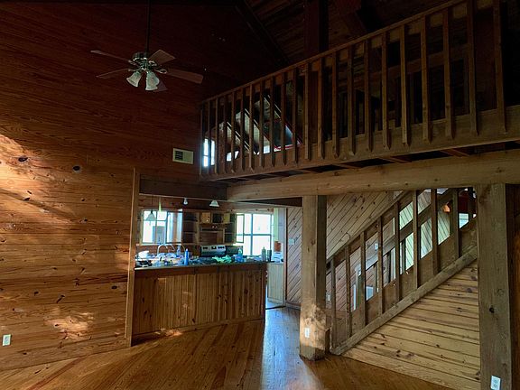 Granite countertops and an open loft provide more space to roam and enjoy.