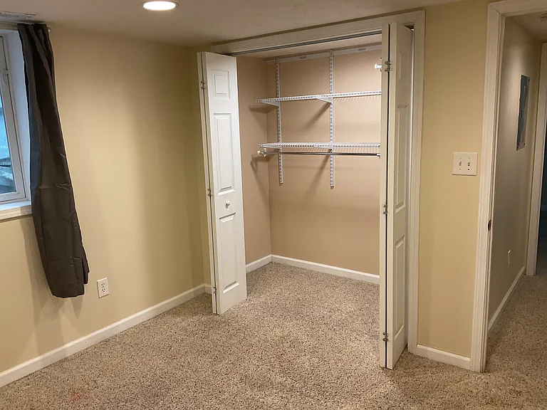 Extra large closet can hold tons of clothing and is able to be changed around to fit your needs.