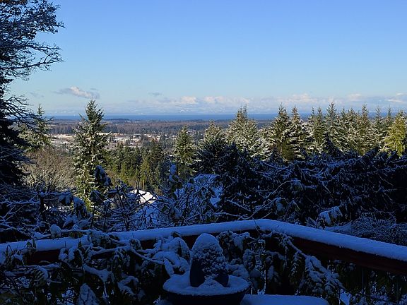 VIEW FROM THE DECK, LIVING ROOM AND BEDROOMS.