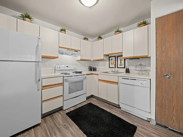 Spacious kitchen with white appliances at Park Lane Apartments in Southfield