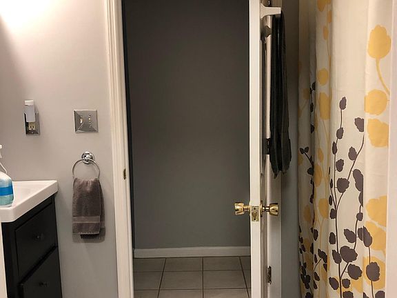 Bath 1 on main level, includes separate attached Bed 1laundry/utility room