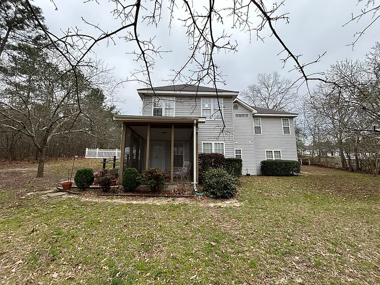 Back of house, downstairs is the separate apartment for rent.