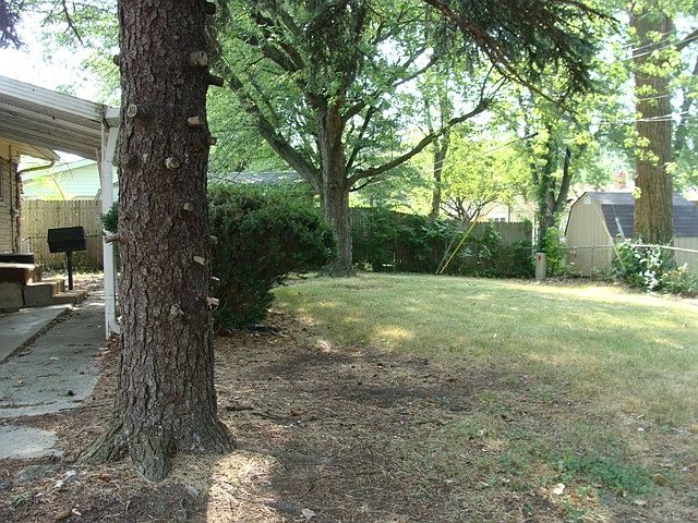 Nice covered patio and fenced yard